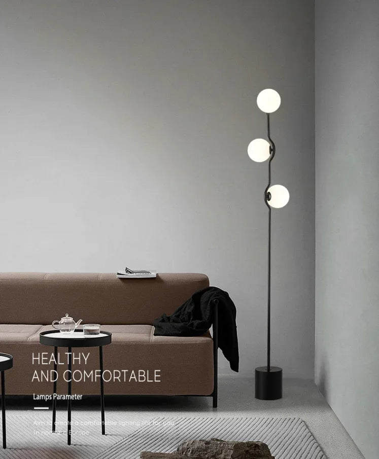 Moderner minimalistischer LED-Bodenleuchter aus Glas mit mehreren Köpfen für Wohnzimmer, Arbeitszimmer und Hotel - Unique Outlet